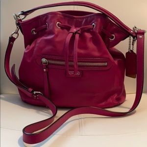 Coach  “Daisy” Leather purse in Magenta/Pink.